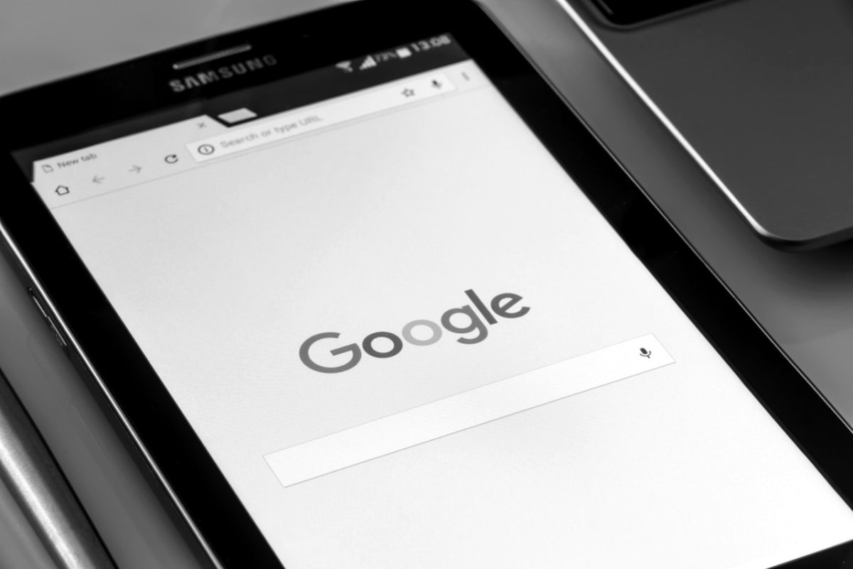 Symbolic image What SEO stands for: tablet with google search mask open